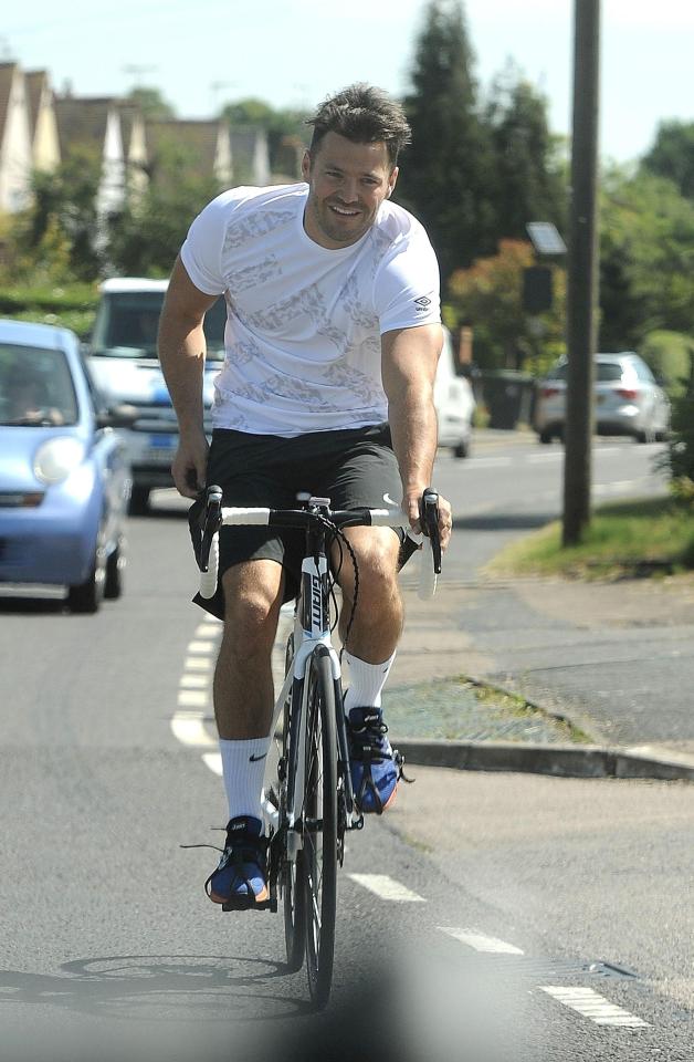  Mark Wright was all smiles as he put his spat with Lauren Goodger behind him on a bike ride with Arg