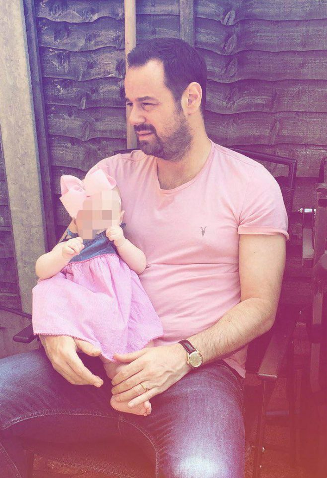  Danny Dyer poses for aww-worthy snap with a baby wearing a bow