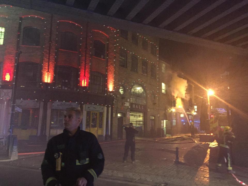  Emergency workers pictured at the scene of the blaze in Camden on Monday morning