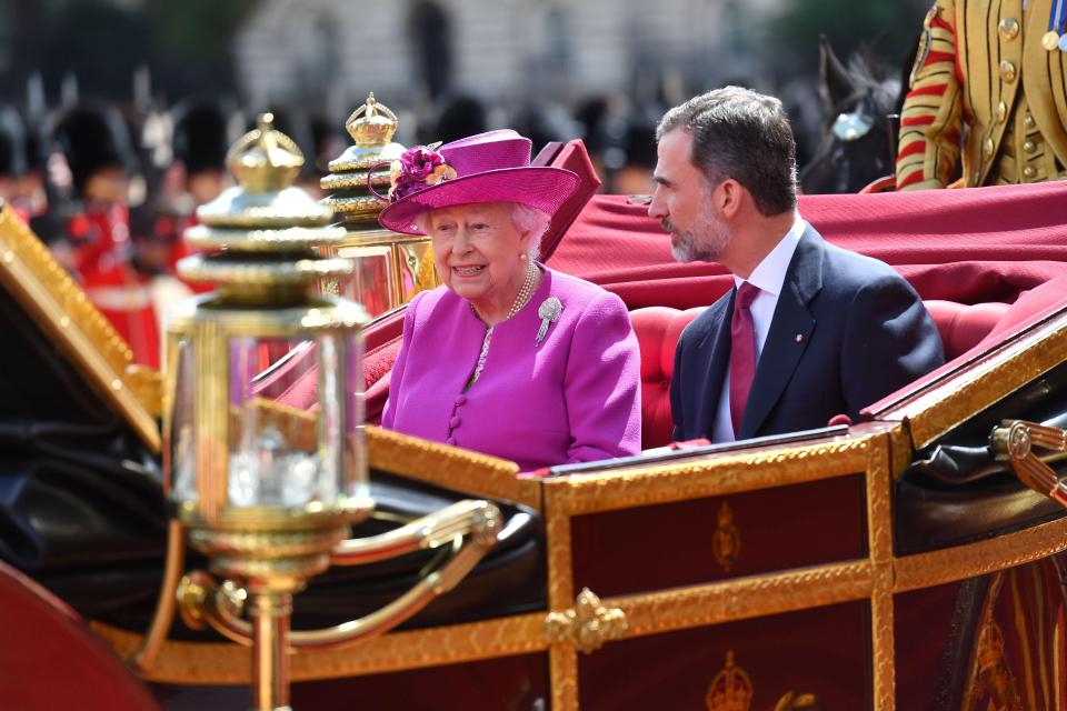  The Queen and King Felipe VI of Spain left in a state carriage following the Horse Guards Parade