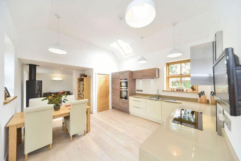 The property has open-plan living and underfloor heating