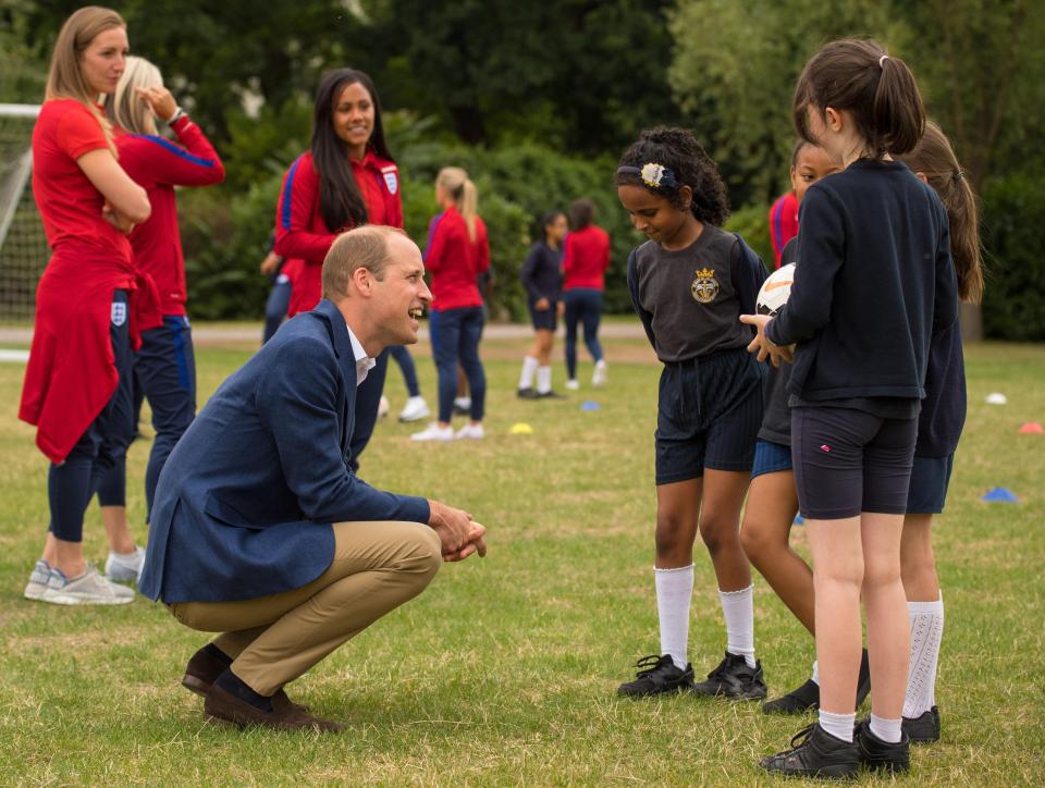  The Prince chats with children from the Wildcats Girls' football programme