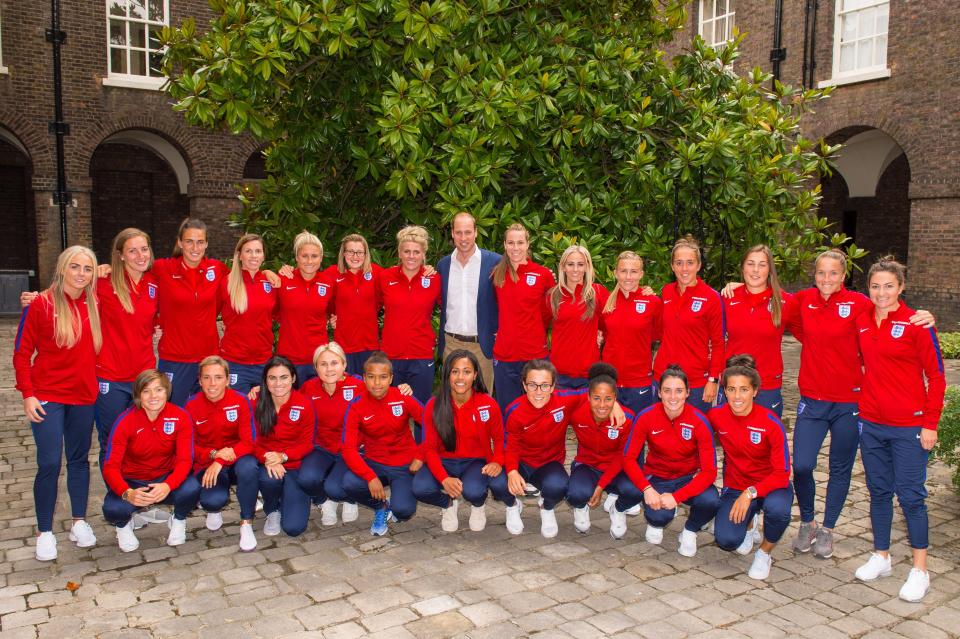  He posed for a group photograph with the England Women football team