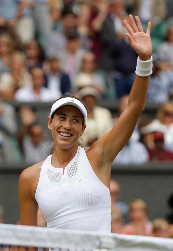 Garbine Muguruza celebrates after securing her position in the Wimbledon final