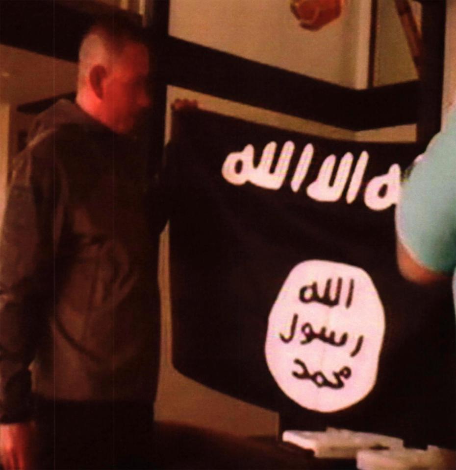  Ikaika Kang appears to hold an Islamic State group flag after allegedly pledging allegiance