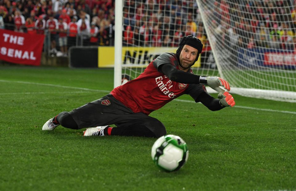  Keeper Petr Cech gets down to make a save in Sydney