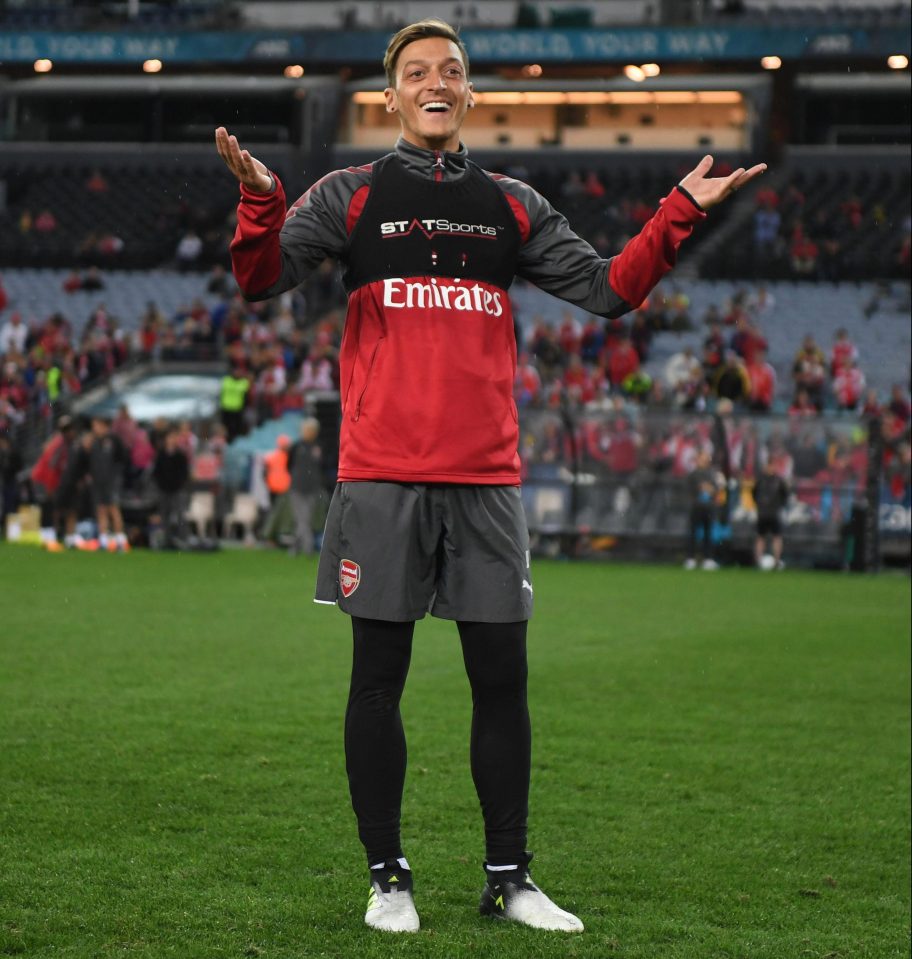  Ozil seemed to be enjoying himself on Arsenal's tour Down Under