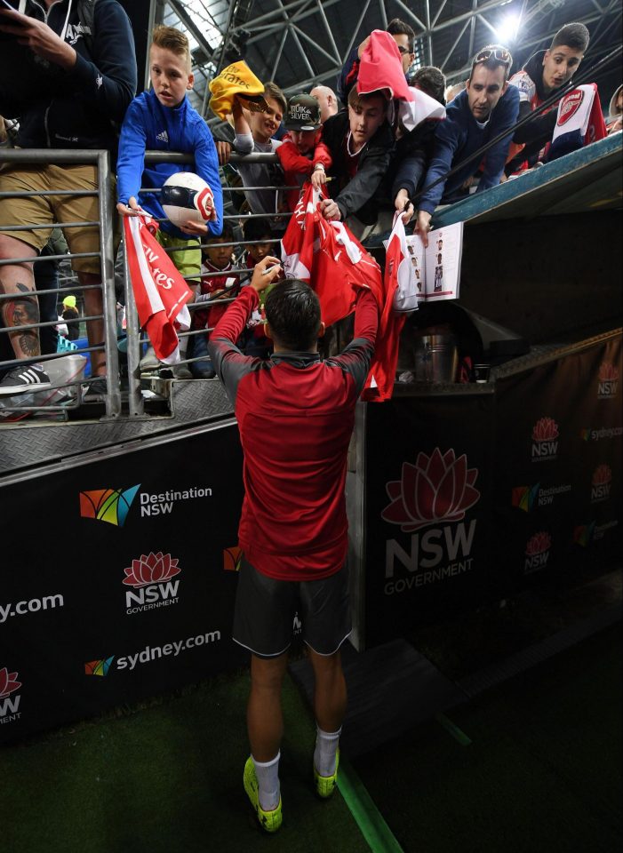  Swiss midfielder Granit Xhaka signs autographs for fans