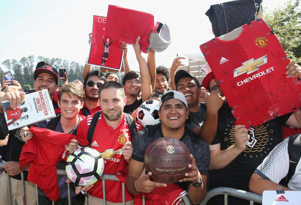  Manchester United fans queue up outside for their heroes