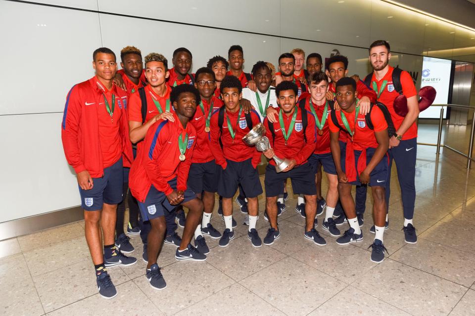  The Under-19 squad get together for a celebratory picture as they arrive home on English soil