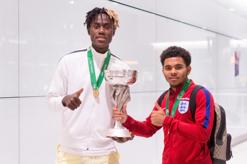  England's Trevoh Chalobah(left) and skipper Jay Dasilva(right) show off the new silverware