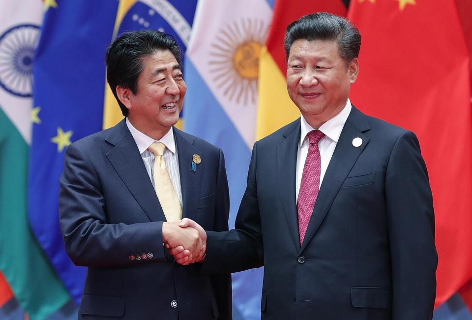  Chinese President Xi Jinping, right, has been likened unto Winnie the Pooh