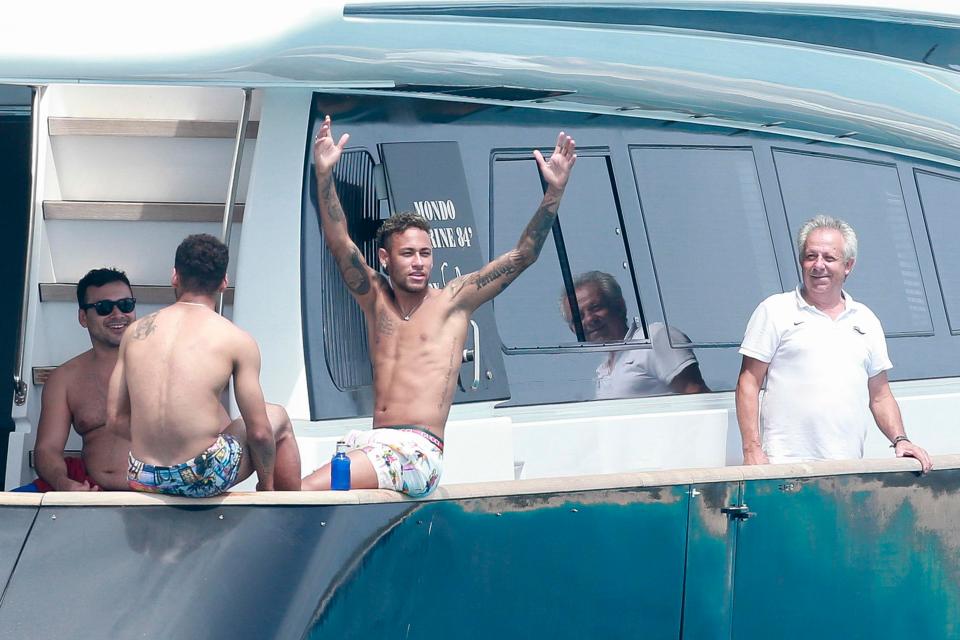 The Brazilian star is not letting the speculation stop him from enjoying himself in Ibiza