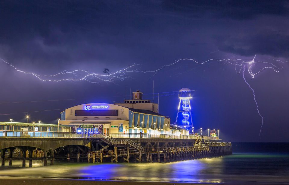  Storm clouds gather over Bournemouth pier. Lightning often strikes close to water