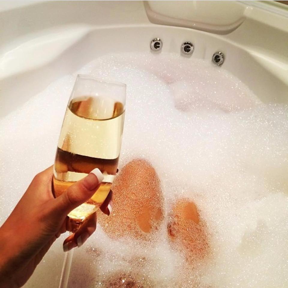  Champagne in the bath for this wealthy lady