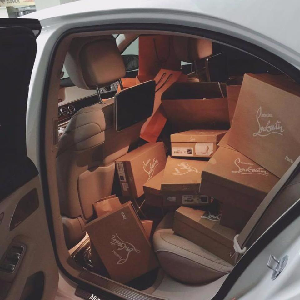  A car packed full of Louboutin shoes - which retail for between £400 and £900 per pair