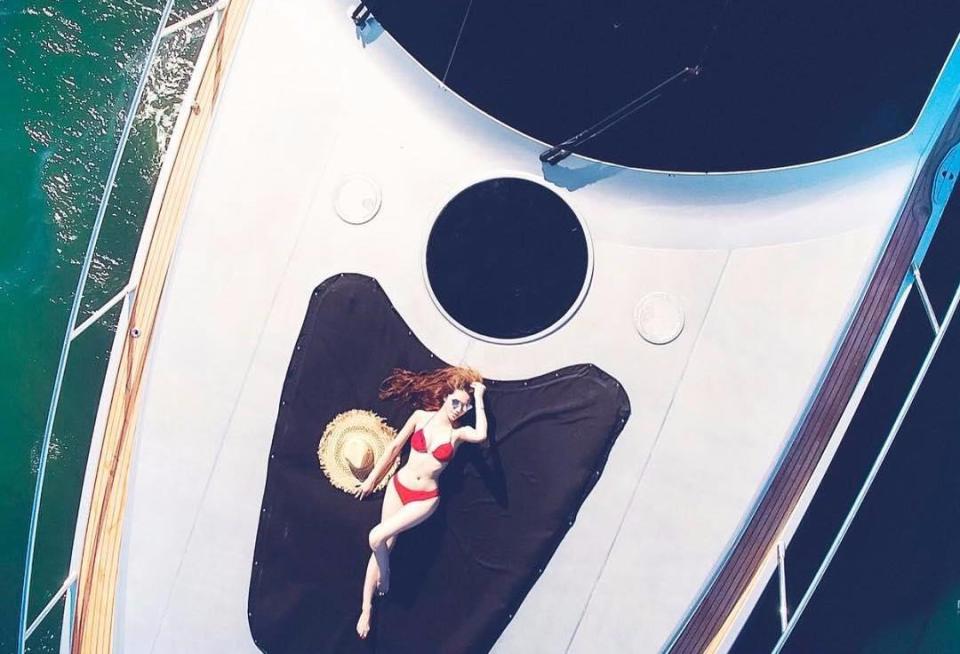  Pictures show the wealthy lot relaxing on private yachts