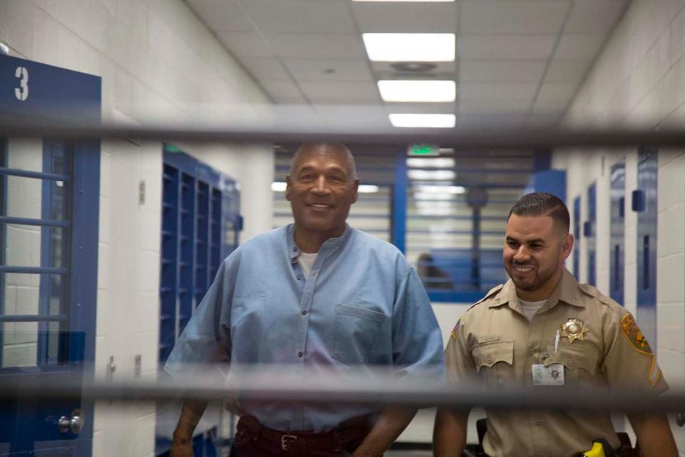  Simpson, pictured smiling at his parole hearing, could be free by October 1