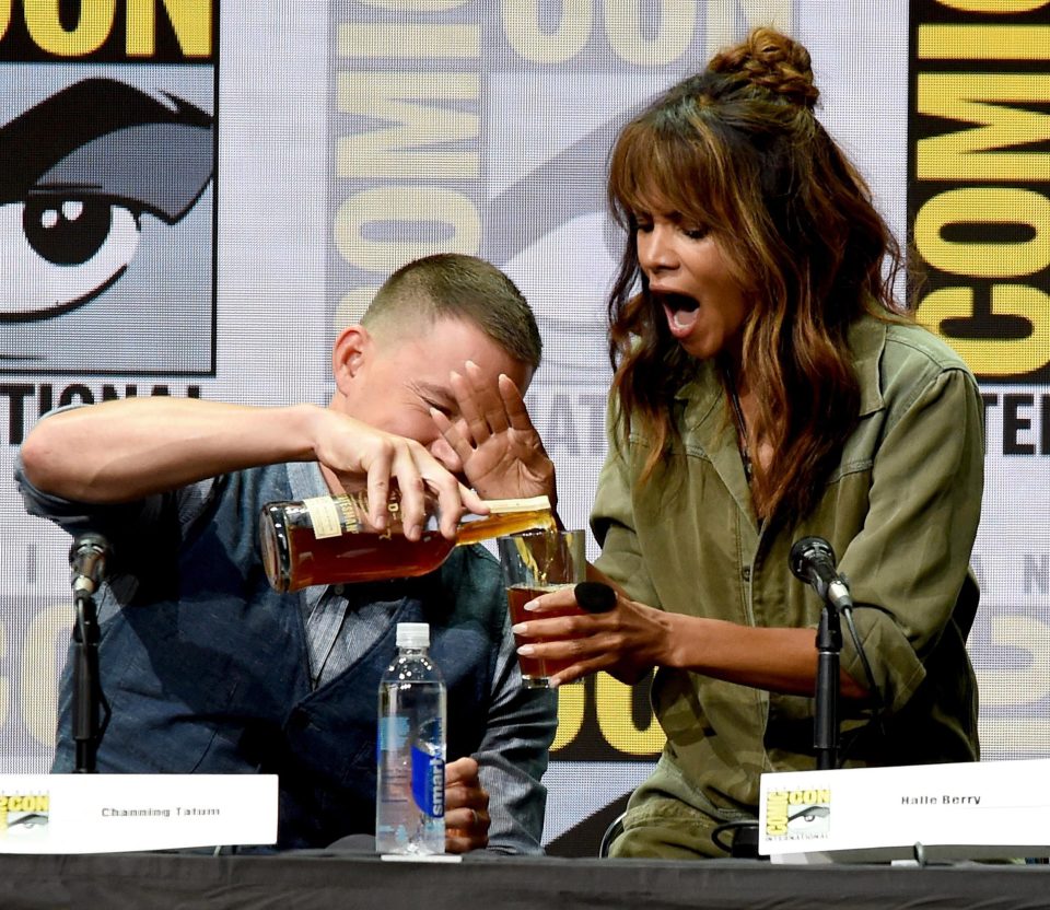  Halle looked slightly alarmed at just how much 'booze' co-star Channing Tatum poured into her glass