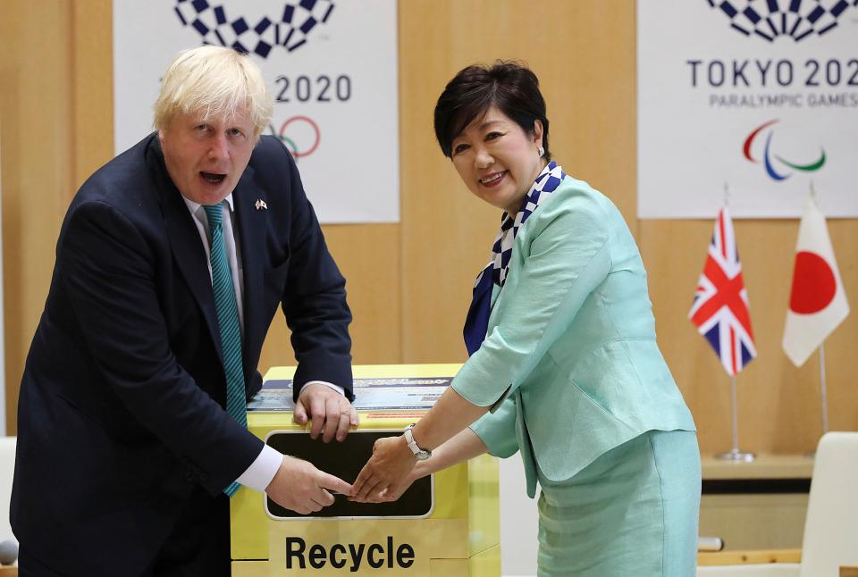  He met with the Tokyo Governor Yuriko Koike as they launched an Olympic mobile phone scheme ahead of the city's 2020 games