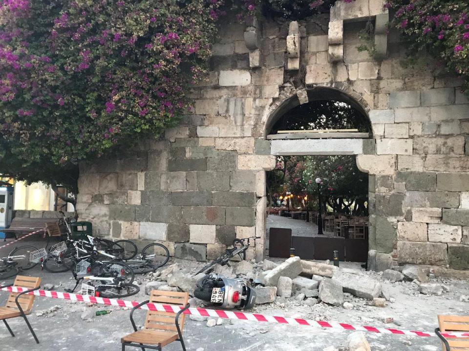  Bicycles and mopeds are seen destroyed by fallen rubble