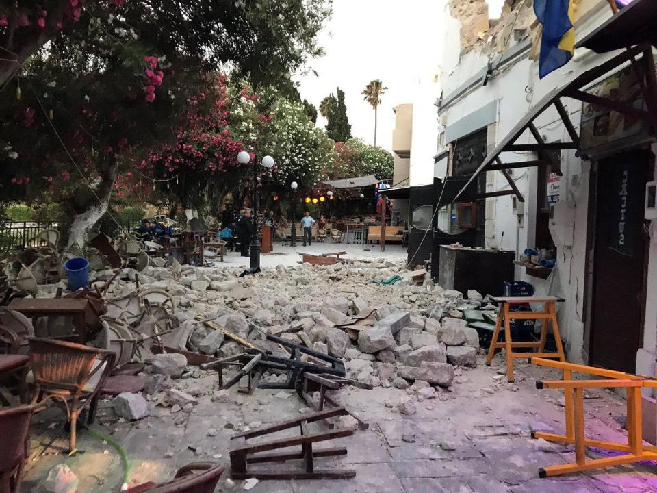  Tables and chairs are seen overturned and crushed in the streets of Kos