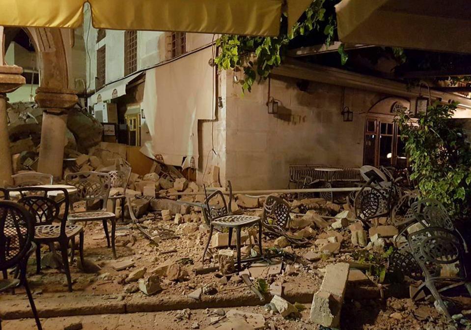  This cafe was left littered with rubble following the 6.7 magnitude earthquake