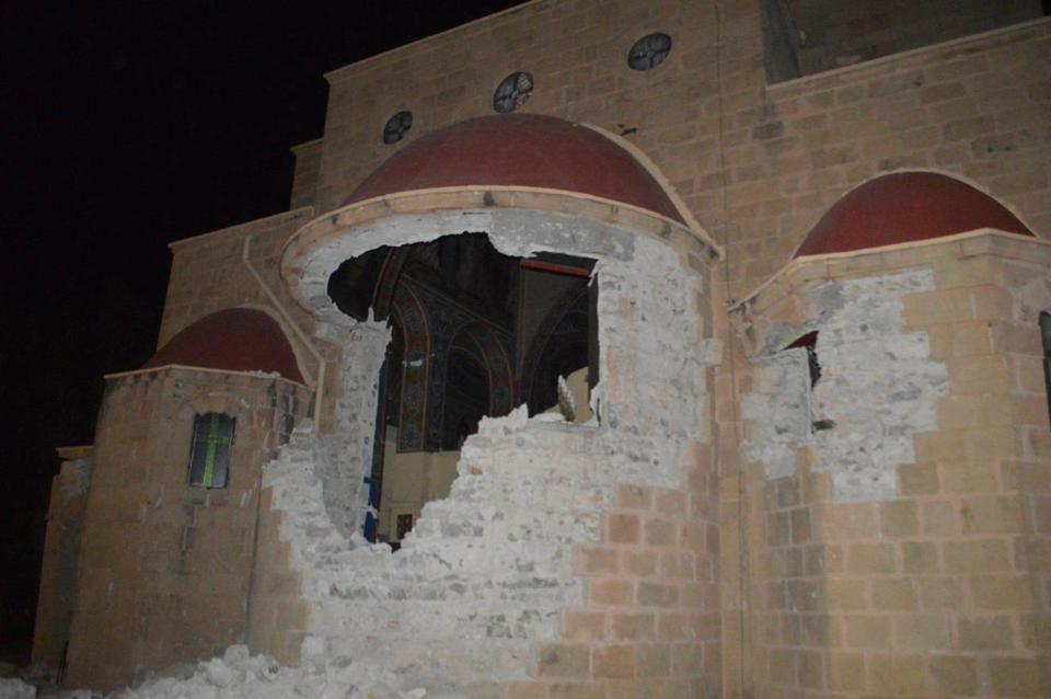  A badly damaged church is seen with gaping holes in its walls on Kos