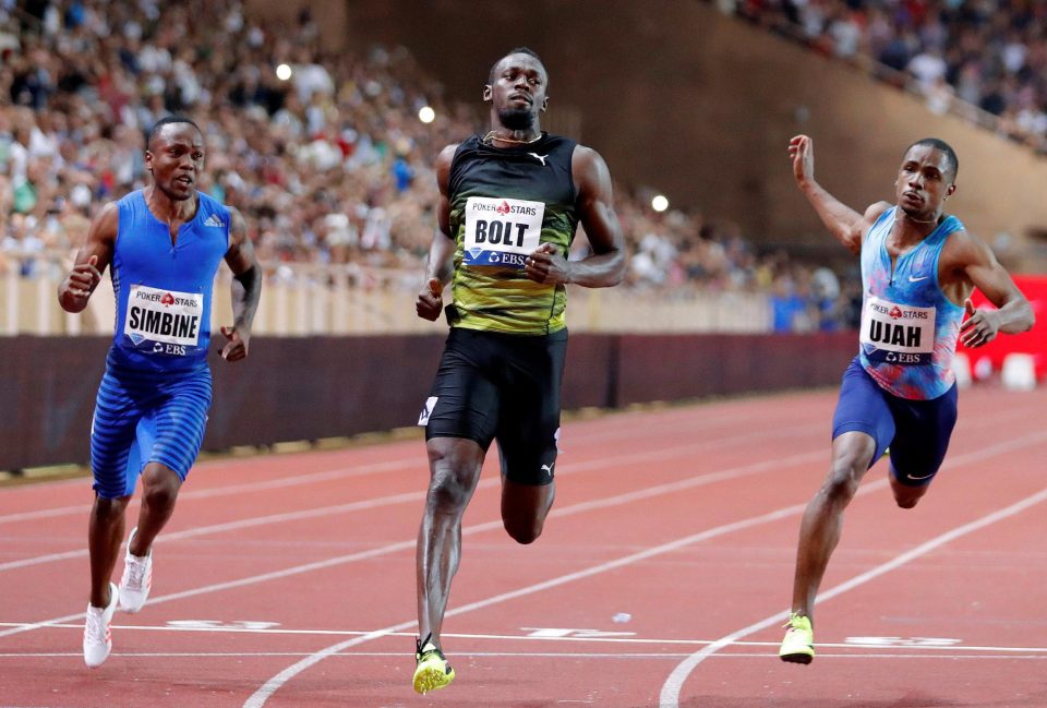 Usain Bolto roared to victory ahead of American Isiah Young, who clocked 9.98secs