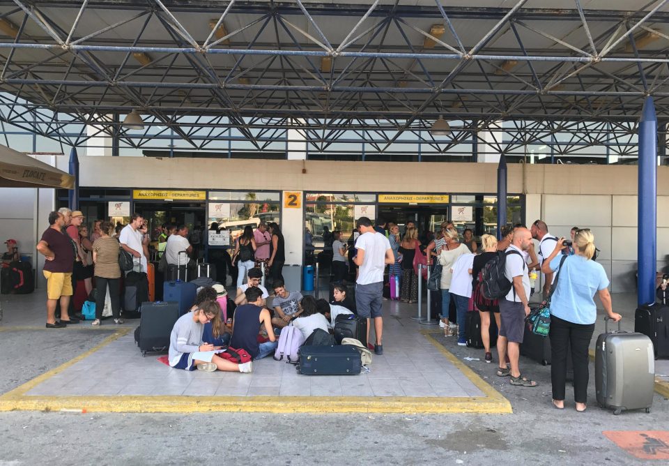  Many were forced to sit on the ground outside the terminal