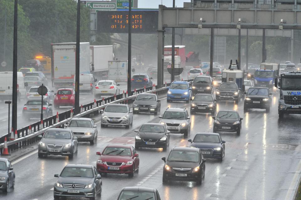  The great summer holiday weekend getaway has got off to a slow, damp start this morning on the M25 in Kent