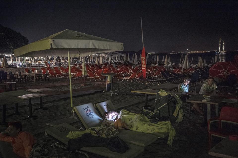  Thousands of holidaymakers spent last night outdoors after being evacuated from their hotels