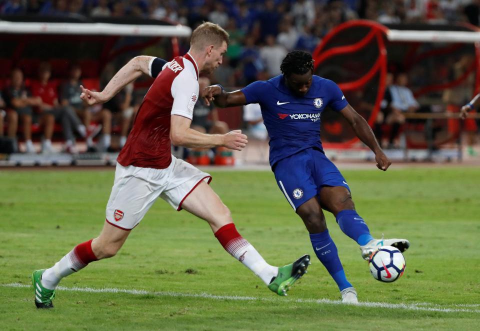  Michy Batshuayi led Per Mertesacker a merry dance as he curled home a beauty for 2-0