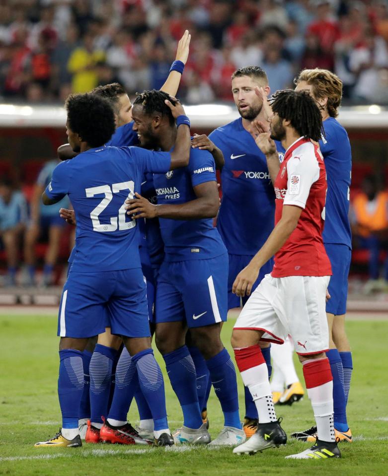  The Chelsea players come together to celebrate Michy Batshuayi's second goal to make it 3-0