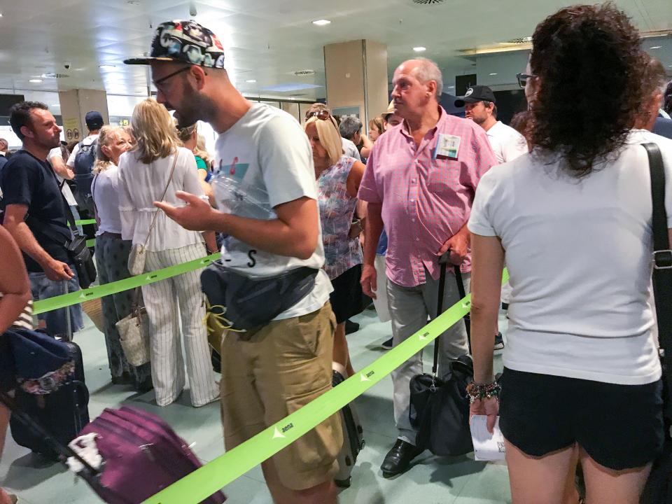  Pictures revealed long queues of Brits at the busy airport after security went on strike at midnight on Friday night