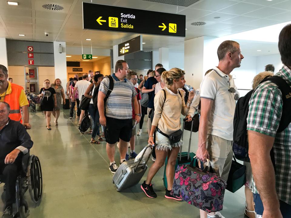  Passengers at Ibiza Airport were forced to queue for up to two hours because of the walkout