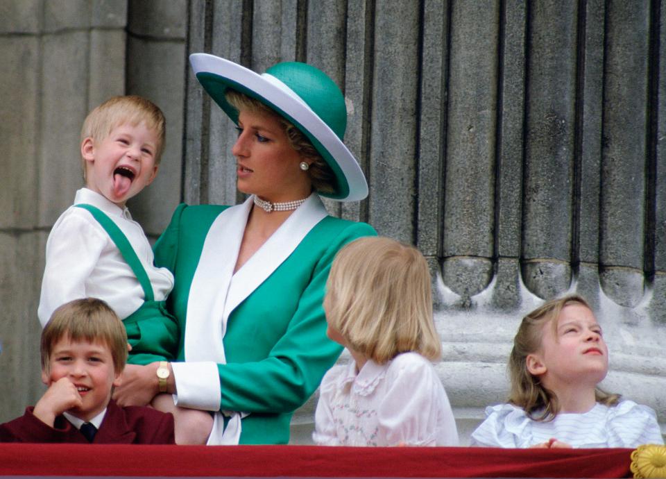  Prince Harry sticking his tongue out with his mother on the Buckingham Palace balcony