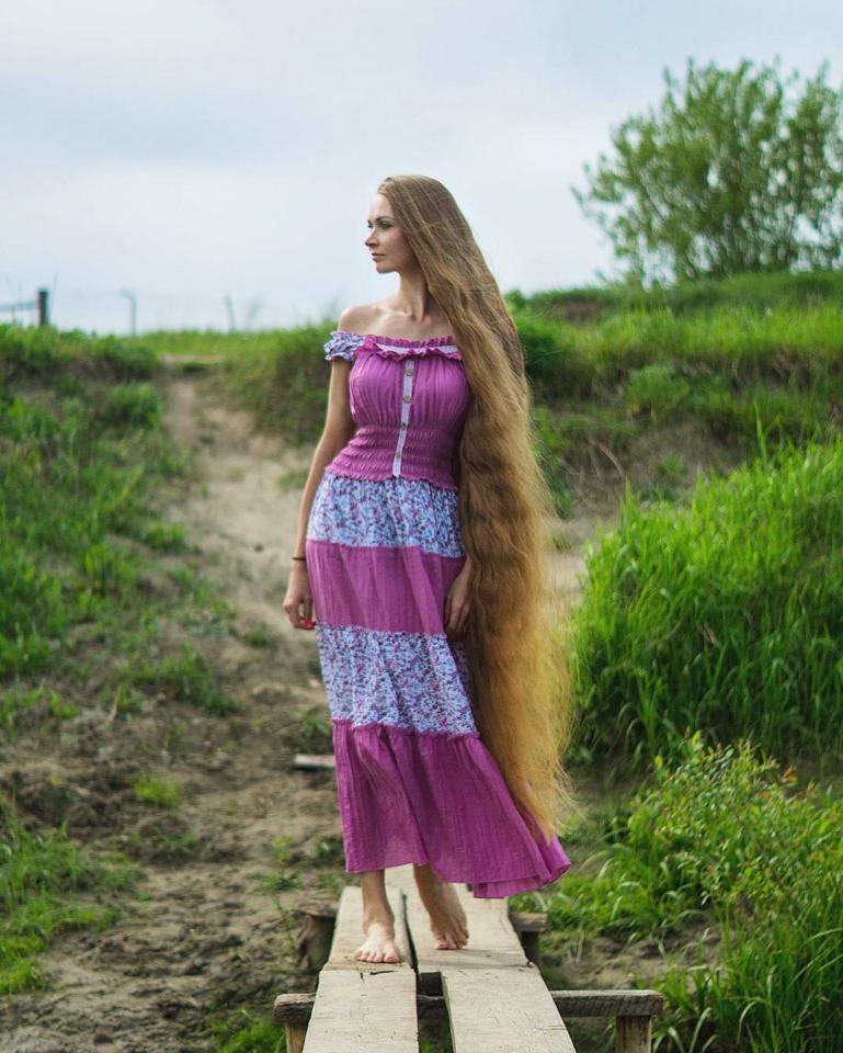  The Russian beauty's amazing head of thick hair now comes down almost to her ankle