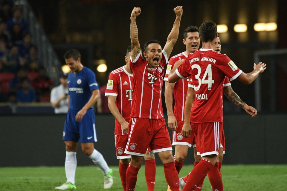  Rafinha celebrates firing Bayern Munich ahead against Chelsea in Singapore