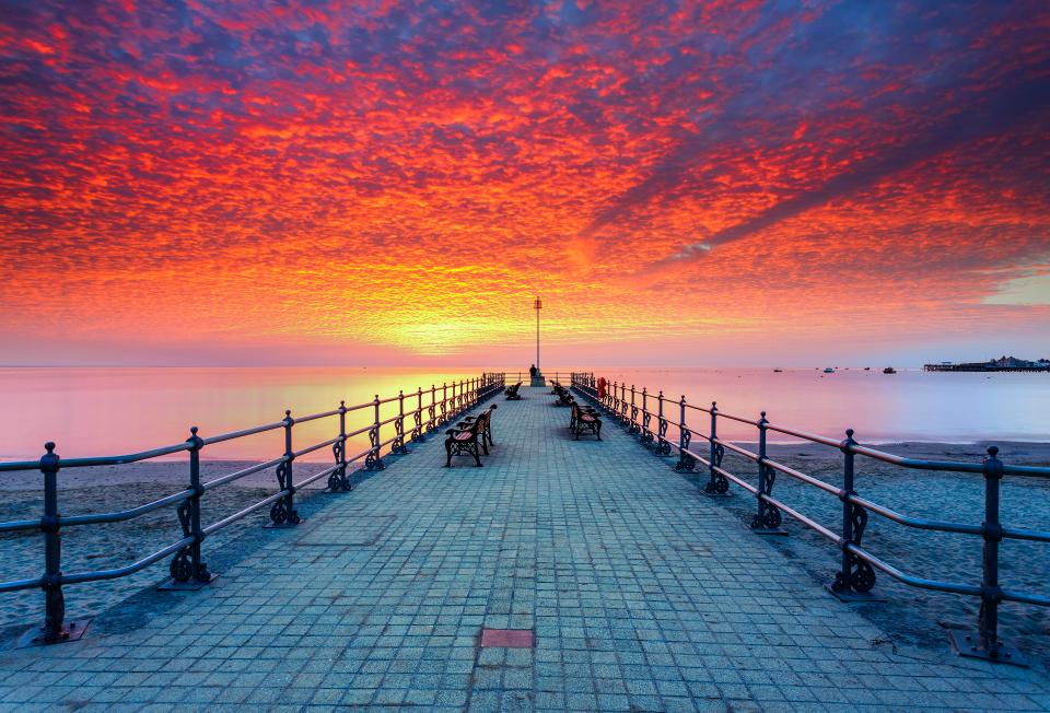  A spectacular sunrise over Banjo Pier at Swanage in Dorset, captured by Daniel Wretham