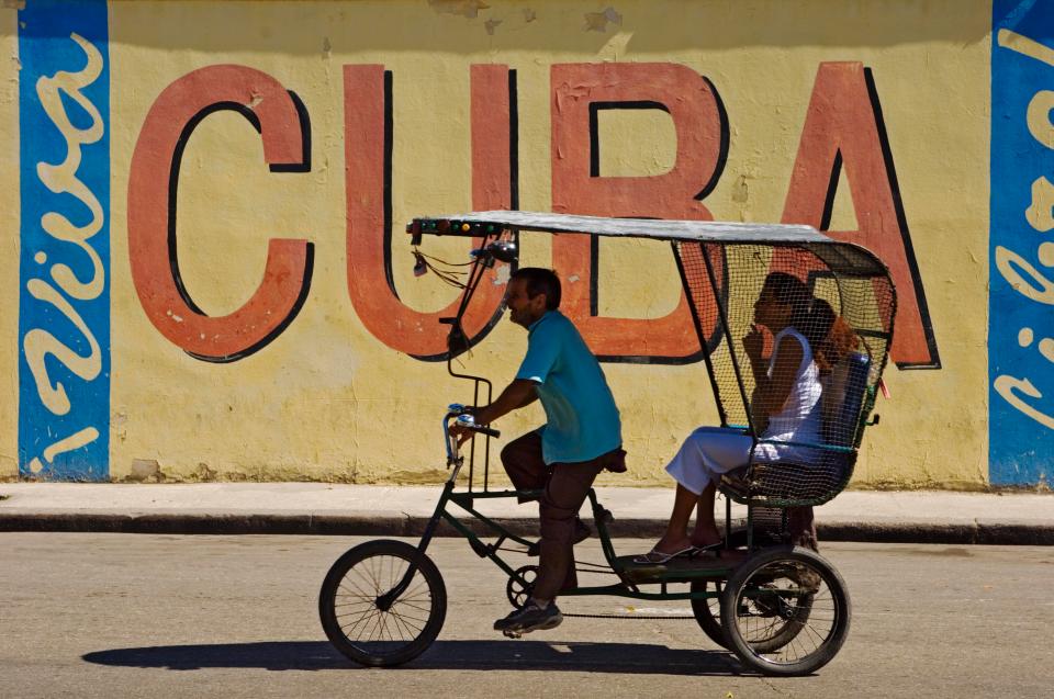  Traditional rickshaw on the streets of Havana