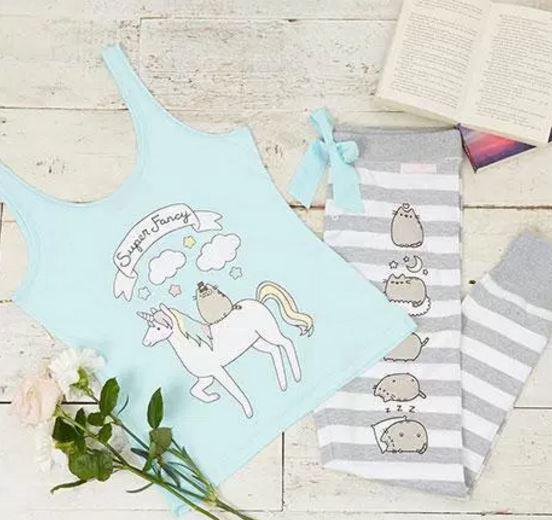  Pusheen is seen riding a unicorn on a pyjama vest top, which can be paired with grey striped bottoms