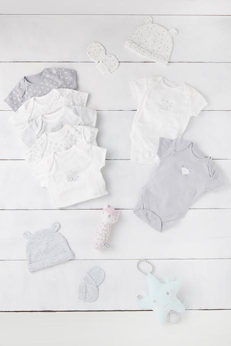  The range is for newborn babies to kids aged 36 month, and includes seven short-sleeved babygros (seen here) for £7. A two pack of hats and mittens will cost £2.80, and the line boasts rattles and toys too