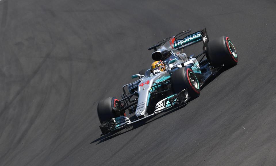  Lewis Hamilton is now 14 points behind Ferrari driver Sebastian Vettel in the standings