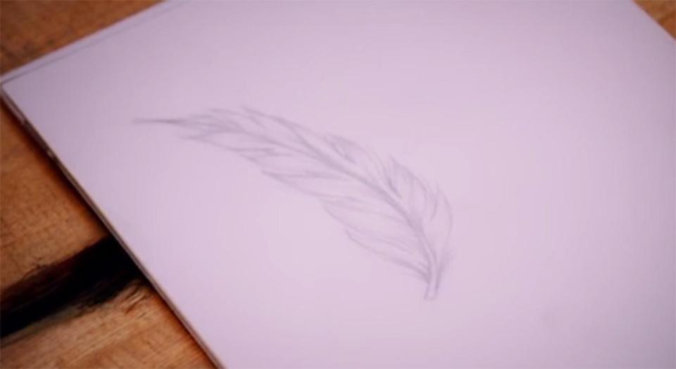  Gabriela selected Glen's design, which featured a feather that was going to be in pink and purple