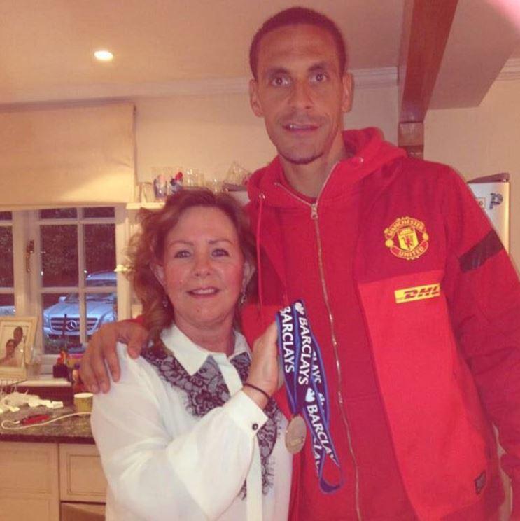  Rio Ferdinand posted this picture of his mother Janice on Instagram as she holds a Premier League winner's medal