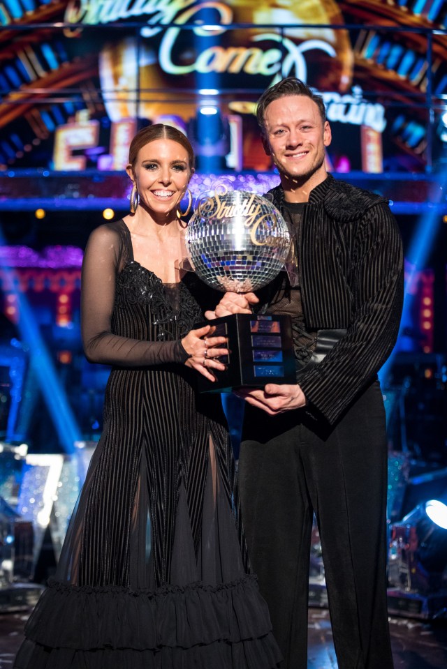 Stacey and Kevin pose proudly with the Strictly Come Dancing Glitterball trophy