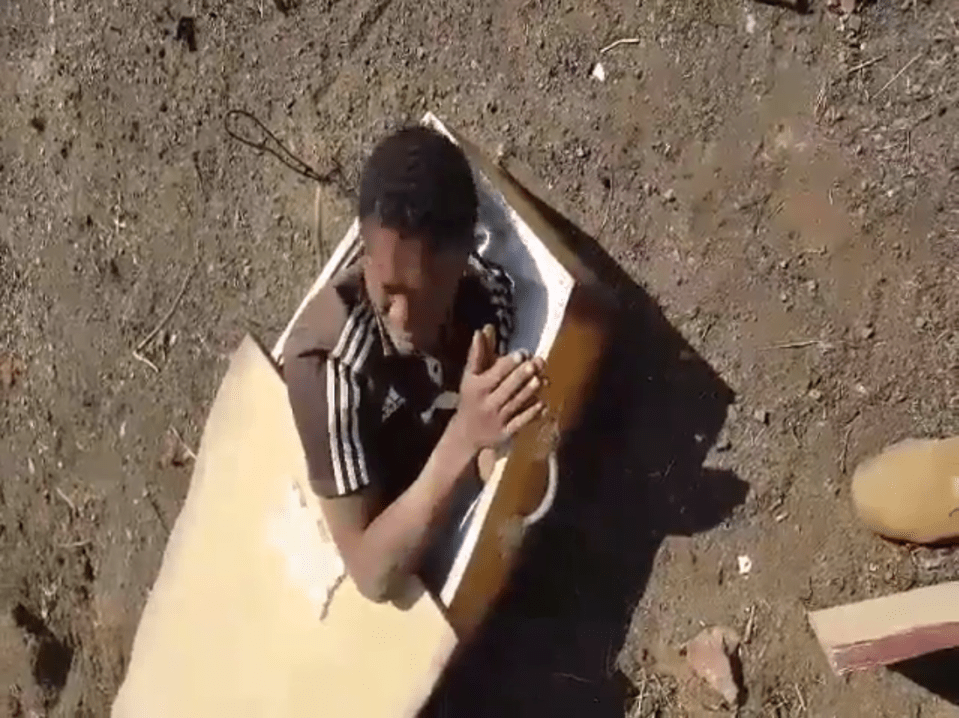  Victor Mlotshwa was forced into a coffin by two white men in South Africa