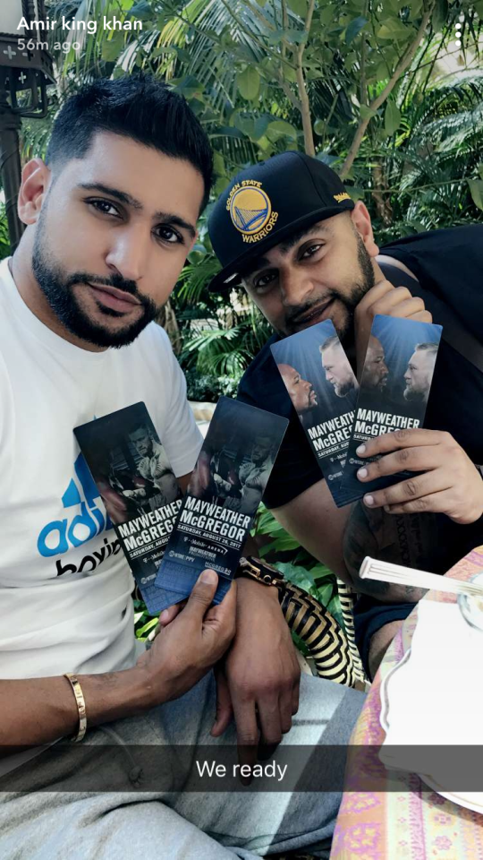 Amir posted this picture on his Snapchat story as he poses with his tickets for the McGregor vs Mayweather fight tonight