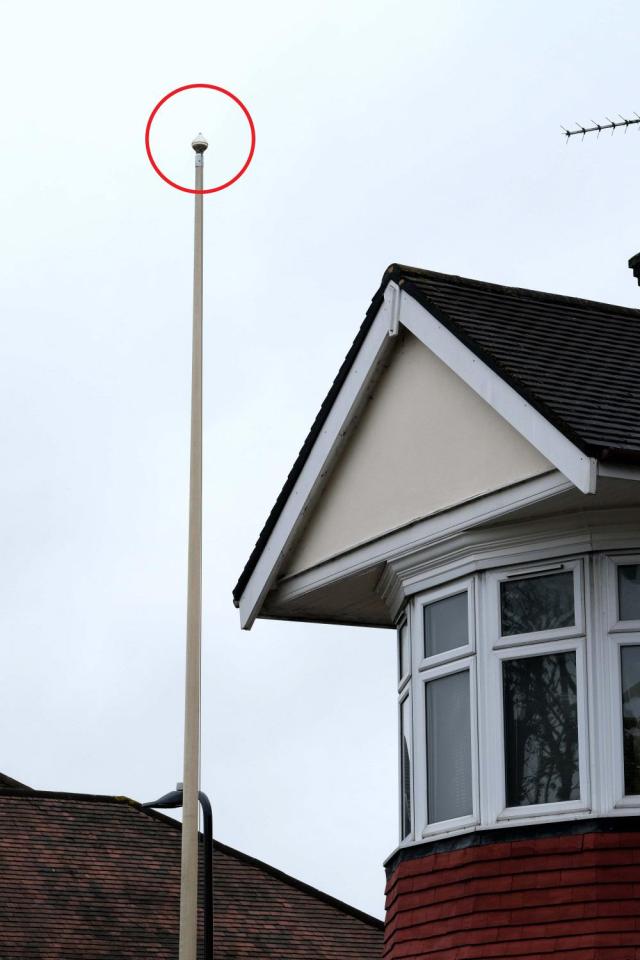  A North Korean flag is rarely seen flying from a flagpole outside the property